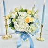 A picturesque blend of yellow and blue blossoms reminiscent of a serene