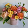 This arrangment is basically screaming happiness and joy.  Designed with shimmer