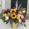 Beautiful version of nature in all its colors. Whit sunflowers, succulents,roses,ranunculus and