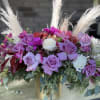 Modern bouquet to brighten any space.Roses.pampas,tulipanes and other seasonal foliage and flowers.