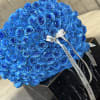 A bouquet of 100 azure roses, a cascade of serenity and grace
