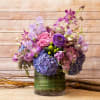 EXQUISITE ASSORTMENT OF HYDRANGEAS, SWEET PEAS, LISIANTHUS, LILAC, PREMIUM UNIQUE TULIPS, GREEN
