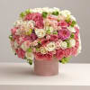 A mix of pink and white specialty roses with a hint of
