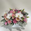 White oval Ceramic bowl with Flush Garden Roses, Pink roses, and carnations