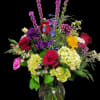 Mixed arrangement of hydrangea roses, liatris ,Daisy&#039;s, Alstroemeria carnations, and delphinium it&#039;s