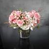 Uniquely designed to create a memorable impression, this spectacular arrangement of beautiful