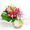 This unique arrangement is simplistic elegance with a contemporary flair. Asymmetrically placed