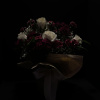 Tranquil whites roses, hot pink and soft pink carnations that mingle together