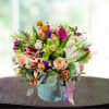 A Grandiose Many flower box arrangement by ABM Floral Studio is a