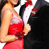 A classic red rose boutonni&egrave;re/Pin-On-Corsage that compliments any suit or dress. Perfect