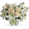 Cr&egrave;me roses, white asiatic lilies and stock stem are incredibly arranged in