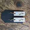 Handcrafted Maple Wood Earrings: Virginia Lily Lace

Adorn your ears with the delicate