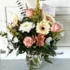 Lemon yellow, Gerber Daisys, Crema mums and baby pink roses come together