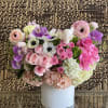 A simple, sweet gift arrangement of orchids and roses!