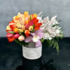 Fill your loved ones day with color! This beautiful Tulip arrangement with