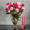 Elevate your surroundings with this opulent floral arrangement that marries the finest