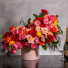 The &quot;Let&#039;s Stay Together&quot; floral arrangement bursts with colorful roses, garden roses