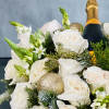 For a White holiday look, this elegant diversion combines soft Holiday Greens