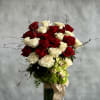 Beverly Hills Florist presents this elegant glass footed vase which holds 1