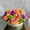 An abundant and colorful floral fantasy consisting of luscious Imported colorful tulips