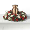 Memorial urn wreath with pixie carnations, cushions, and babies breath. 