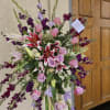 This multi floral standing spray comes delivered straight to your event in