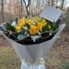 Bask in the warmth and joy of a dozen exquisite yellow roses