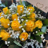 Bask in the warmth and joy of a dozen exquisite yellow roses