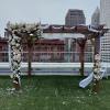 Beautiful white, pink and blush roses, carnations and other flowers huppah decor