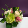 This bouquet graces every room with a touch of elegance.