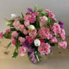 Light pink roses, white tulips, pink carnations, hot pink carnations, purple larkspur