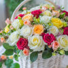 The lovely spring color scheme, displayed in a basket of flowers, radiates