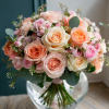 Delight in the exquisite charm of flowers entwined in a peach-hued ballet
