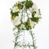 A beautiful European garden sympathy wreath of fresh flowers is a heartfelt