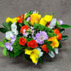 Assorted summer flowers and roses in playful color combinations.  Assortment and