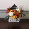 This modern and lovely flower arrangement is a mix of flowers in