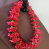 These beautiful carnation leis can be made in two colors -Example -