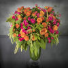 A vibrant mix of gorgeous orange and hot pink Roses in a