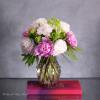 Available for Same-Day Delivery!

Nestled within a sleek vase, the Ethereal Elegance arrangement