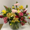 Spring mixture in shades of pinks, yellows , red, and coral tones.
