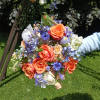 Beautiful vintage orange, blush, white and blue motives with fillers and greenery