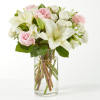 The Kindhearted Bouquet is a gentle swirl of pale pink and ivory