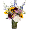 A mix of hydrangeas, sunflowers, and gorgeous skyline-colored flowers. 