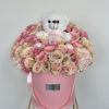 Welcome the newest member of the family with this enchanting flower arrangement