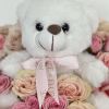 Welcome the newest member of the family with this enchanting flower arrangement