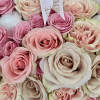 Welcome the newest member of the family with this enchanting flower arrangement