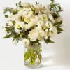 The Snowy Serenity Bouquet is a breathtaking arrangement that embodies the pure