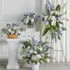 Featuring soothing tones of blue and white, the traditional arrangements of this