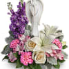 Show your sympathies with Angel Love. This design has lilies, roses, carns