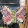 This beautiful butterfly comes in any color choice with standing isle